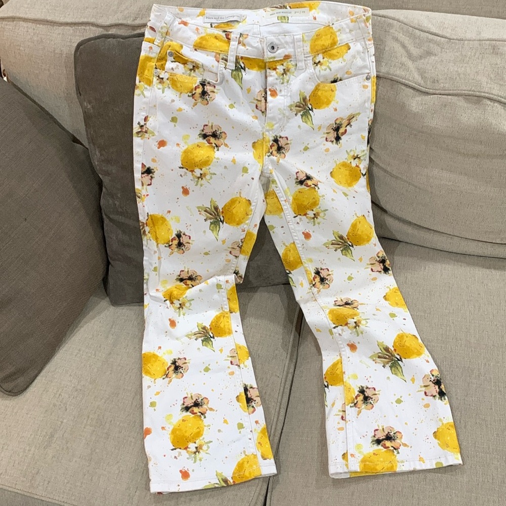 Super cute lemon and flower print white denim high-rise bootcut by Anthropologie